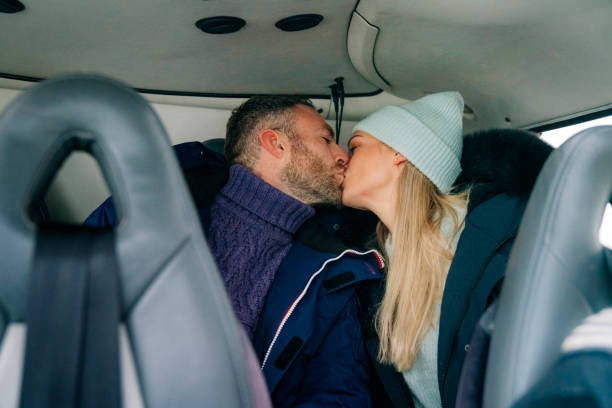 Loving couple on a trip in a helicopter