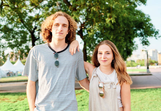 istock Two young friends having fun together 1341277013