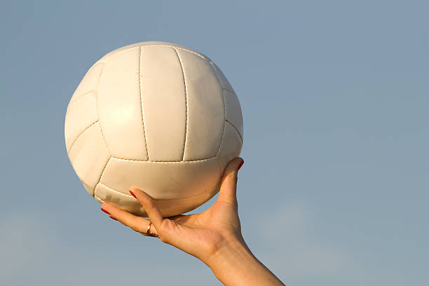 istock Female  hand   ball  sky 134127872