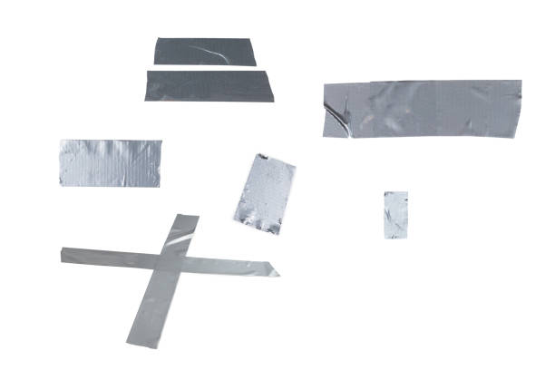 istock Silver scotch tape pieces isolated on white background. 1341281882