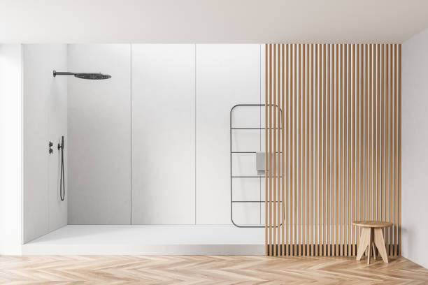 istock Big white shower area with wooden details 1341283690