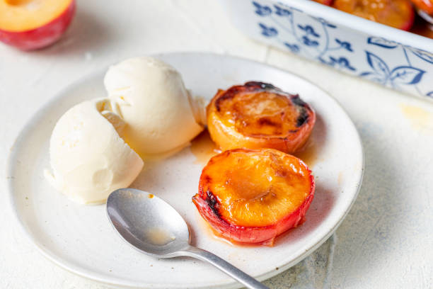 istock Plums Roasted and Baked. Serving Sweet Dessert 1341283704