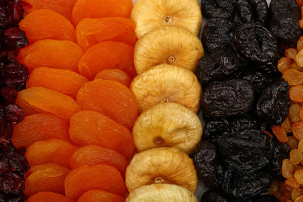 dark dried apricots of large size, dried apricots in sunlight with preservation of useful vitamins
