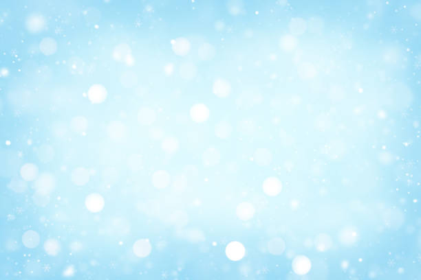 blue lights holiday bokeh. Abstract winter time background. Blue holiday bokeh. Abstract winter time background. light blue stock pictures, royalty-free photos & images