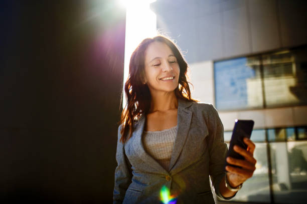 istock Businesswoman texting 1341290425