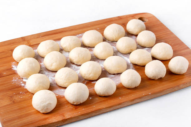 istock Yeast dough balls on the wooden board 1341292945