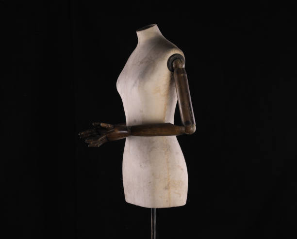 istock antique mannequin on black background 1341294193