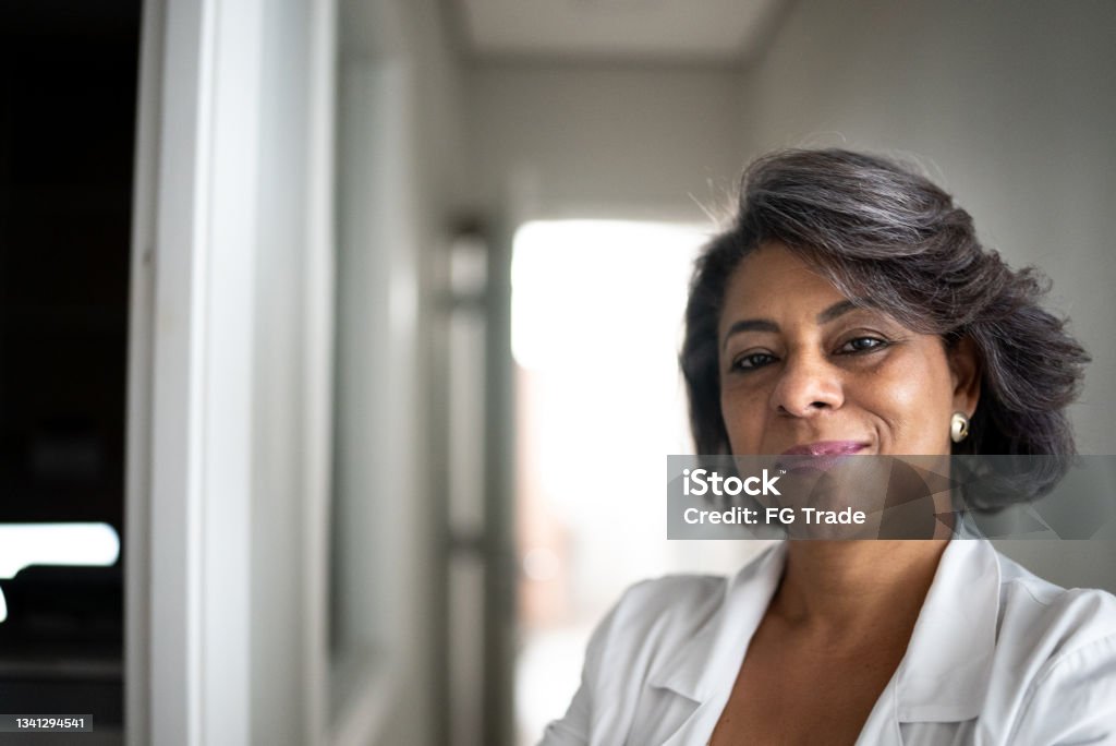 Portrait of a confident female doctor Doctor Stock Photo