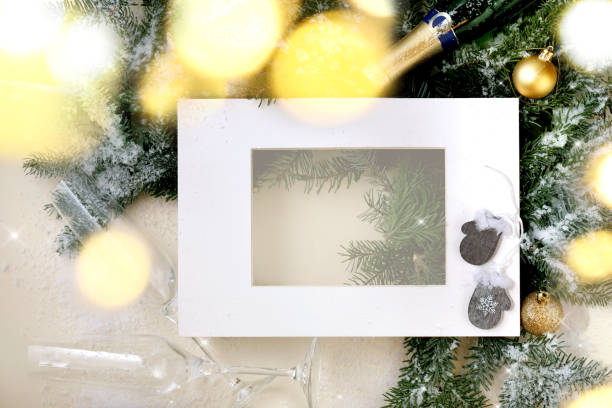 istock Christmas greeting card with fir tree in white frame 1341295571
