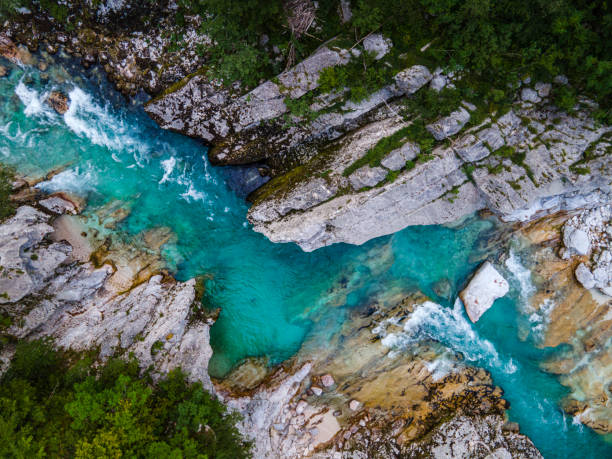 Wild Soca River Valley in Slovenia. Aerial Drone view Top Down. Summer Alpine Landscape stock photo