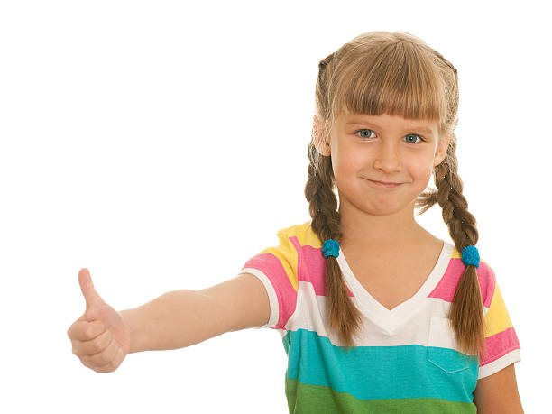 istock Smiling girl demonstrates thumb up 134130225