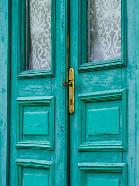 istock Old wooden turquoise door 1341302592