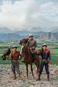 istock Three eagle hunters  in steppe in Kyrgyzstan 1341309978