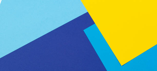 istock Abstract light blue and yellow color geometric paper composition banner background, top view 1341313090