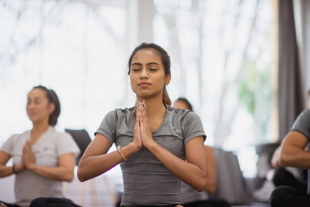 istock Multi-Ethnic Group of Young adults in Yoga Class 1341314706
