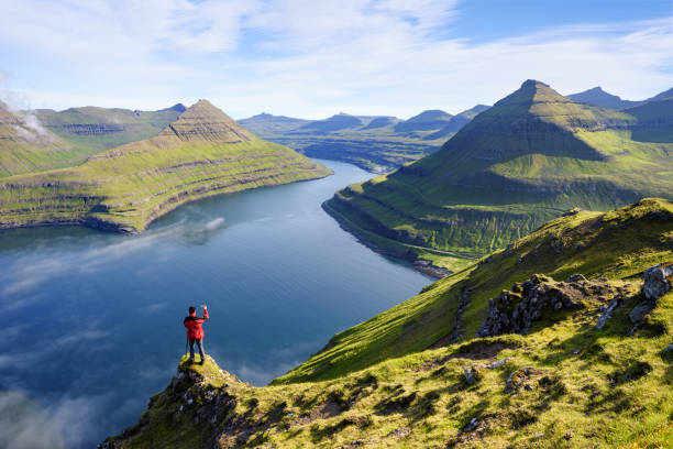 Stunning view of Funningur fjord and of nearby mountains, Faroe Islands Stunning view of Funningur fjord and of nearby mountains on Eysturoy Island, Faroe Islands eysturoy stock pictures, royalty-free photos & images
