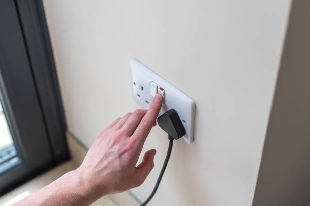 White Uk plug socket White Uk plug sockets being switched off to save electricity and money for the household turning on or off photos stock pictures, royalty-free photos & images