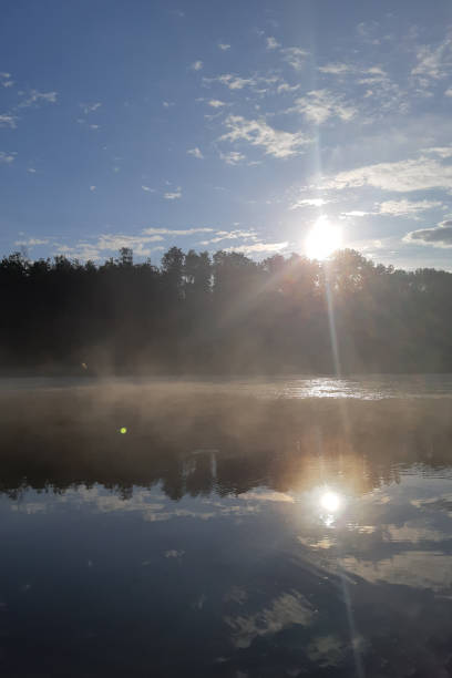 istock Morning Sun on a lake 1341318099