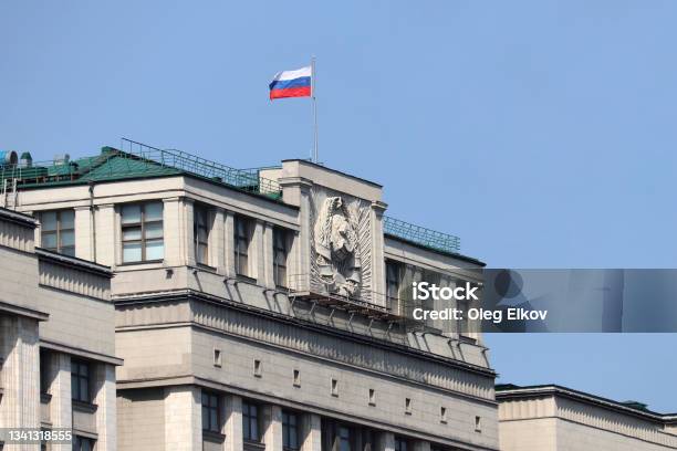 Russian Flag On The Parliament Building In Moscow Stock Photo - Download Image Now - Moscow - Russia, Parliament Building, Russian Flag