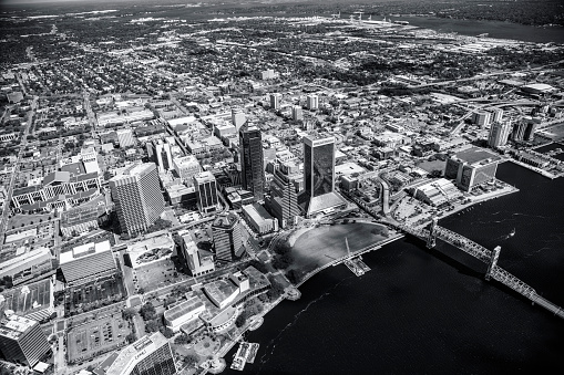 Aerial view of the beautiful skyline of Jacksonville Florida along the St. Johns River from an altitude of about 1000 feet over the city.