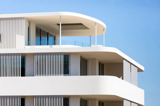 istock Closeup new, modern apartment building, sky background with copy space 1341330095
