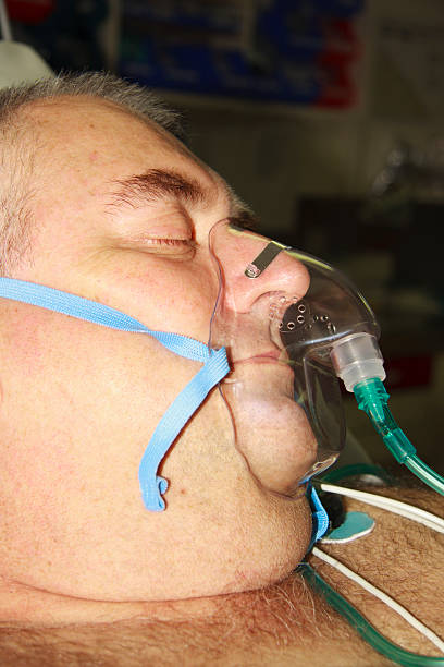 istock Mature man wearing an oxygen mask 134133135