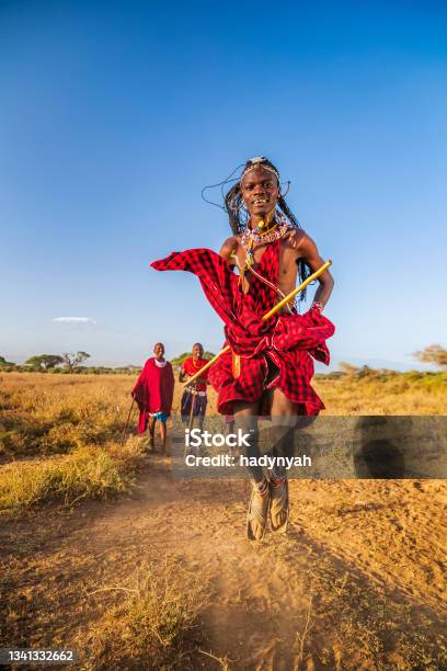 Warrior From Maasai Tribe Performing Traditional Jumping Dance Kenya Africa Stock Photo - Download Image Now