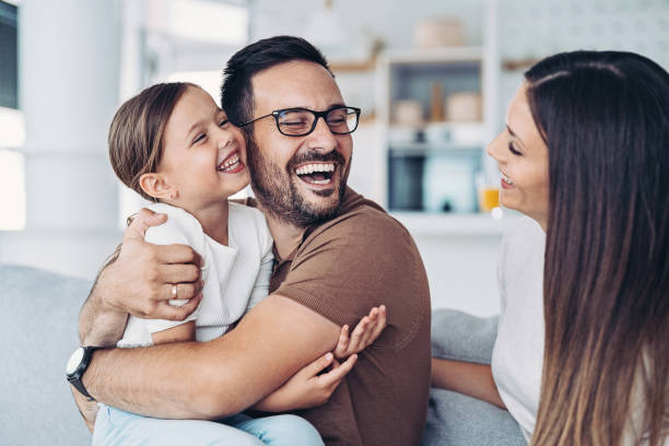 istock Affectionate father holding his little daughter 1341334835