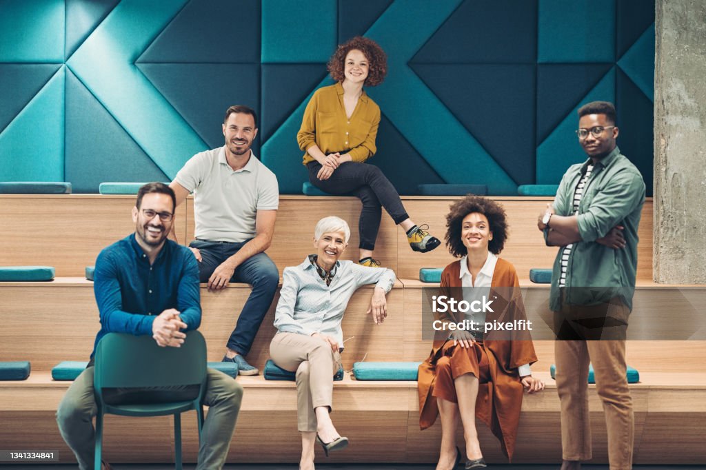 Creative business team Multi-ethnic group of business persons sitting in a modern office Leadership Stock Photo