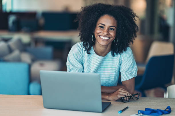 istock Confident smiling businesswoman in her office 1341334844