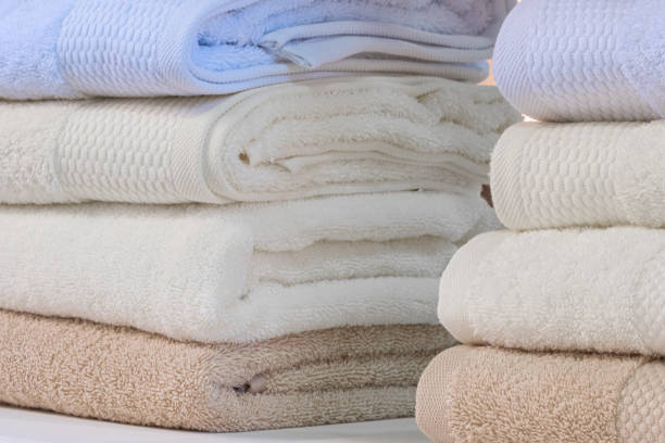 istock Colorful folded towels stack closeup picture. 1341337212