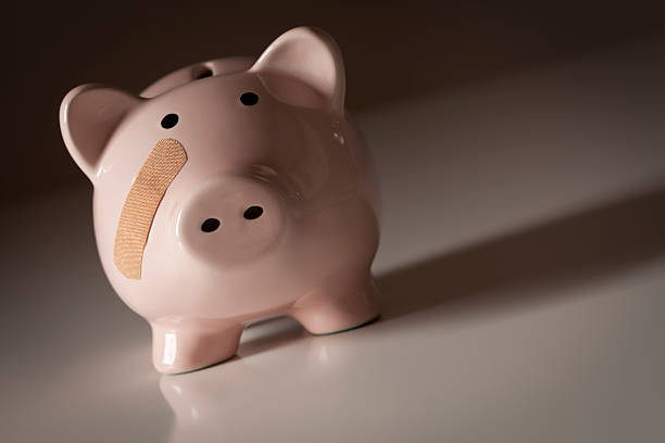 istock Piggy Bank with Bandage on Face 134133756