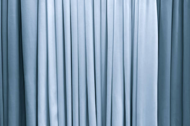 istock Blue fabric texture close-up curtains, Blue Velvet, modern design background sample 1341338336