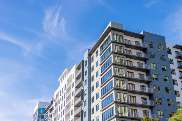 istock Modern urban apartment building in city 1341340164