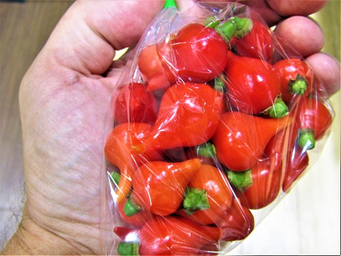 Miniature red bell peppers.