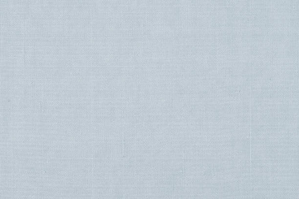 istock Silk fabric wallpaper texture background in light pale blue grey 1341347060