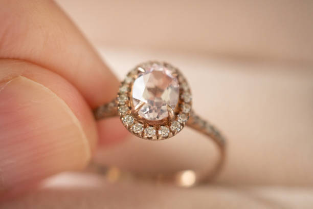 istock hand hold beautiful jewelry diamond ring 1341347253