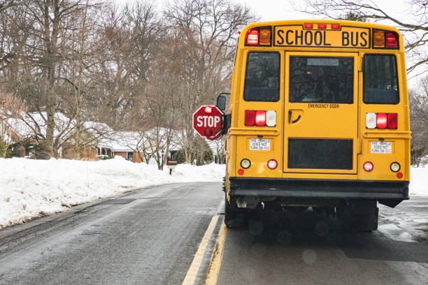 Stopped Yellow School Bus With Flashing Safety Lights