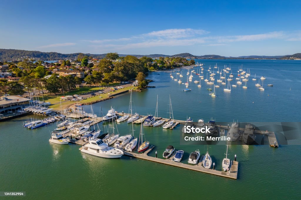 Aerial daytime waterscape with boats Early morning waterscape views over Gosford Waterfront and Brisbane Waters on the Central Coast of NSW, Australia. Gosford Stock Photo