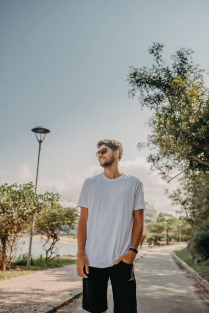 istock young man portrait on the beach 1341358979
