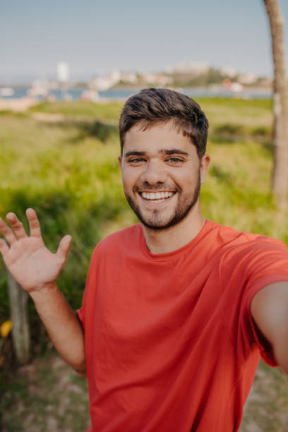 istock young man portrait on the beach 1341359121