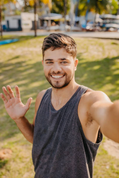 istock young man portrait on the beach 1341359167