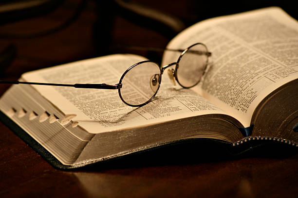 istock Spectacles resting on a page of an open book 134135931