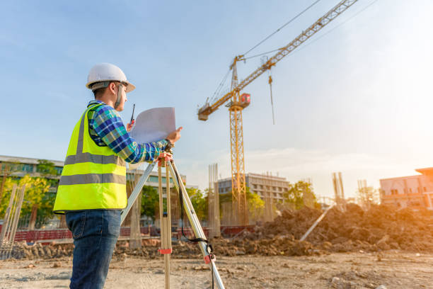 istock engineer inspects work using radio communication with the management team in the construction area. 1341371262