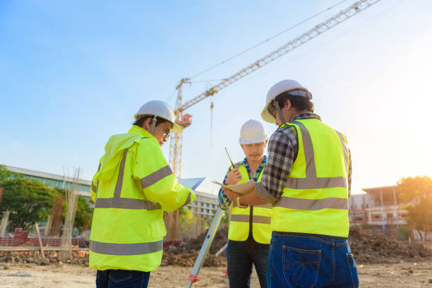 istock Civil engineer inspects work using radio communication with the management team in the construction area. 1341371266