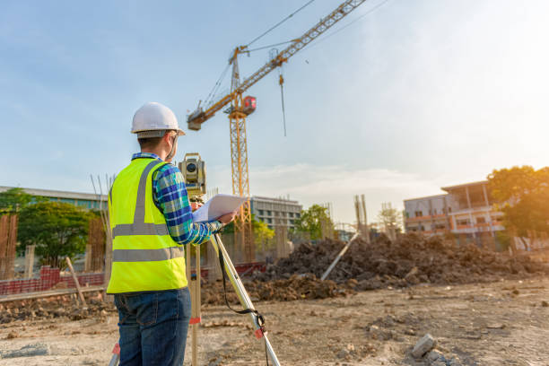 istock engineer inspects work using radio communication with the management team in the construction area. 1341371281