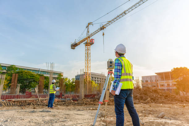 istock engineer inspects work using radio communication with the management team in the construction area. 1341371284