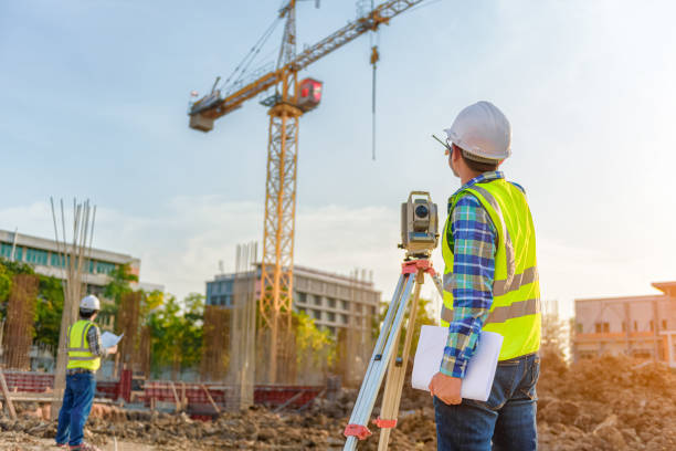 istock engineer inspects work using radio communication with the management team in the construction area. 1341371285