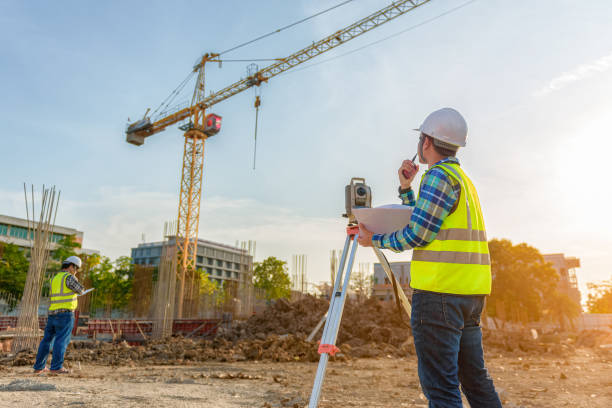 istock engineer inspects work using radio communication with the management team in the construction area. 1341371287