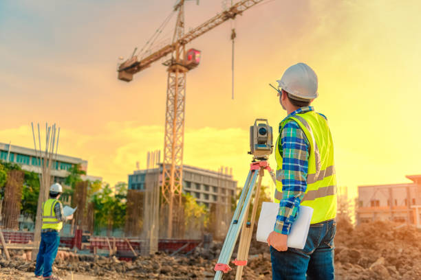 istock engineer inspects work using radio communication with the management team in the construction area. 1341371289